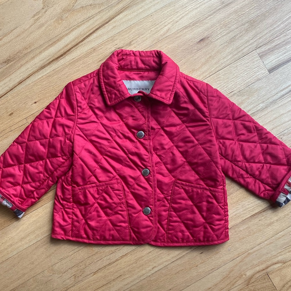 Child’s Burberry red quilted jacket